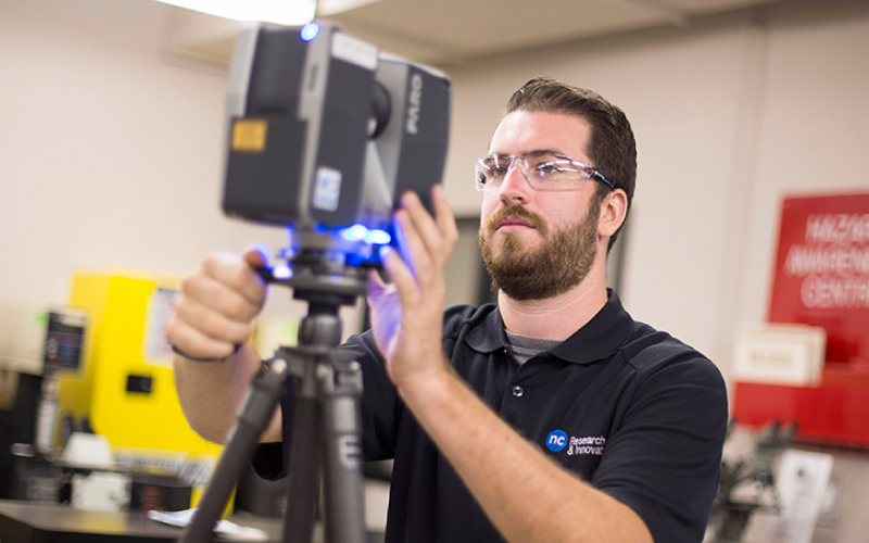 image of research student using a lazer