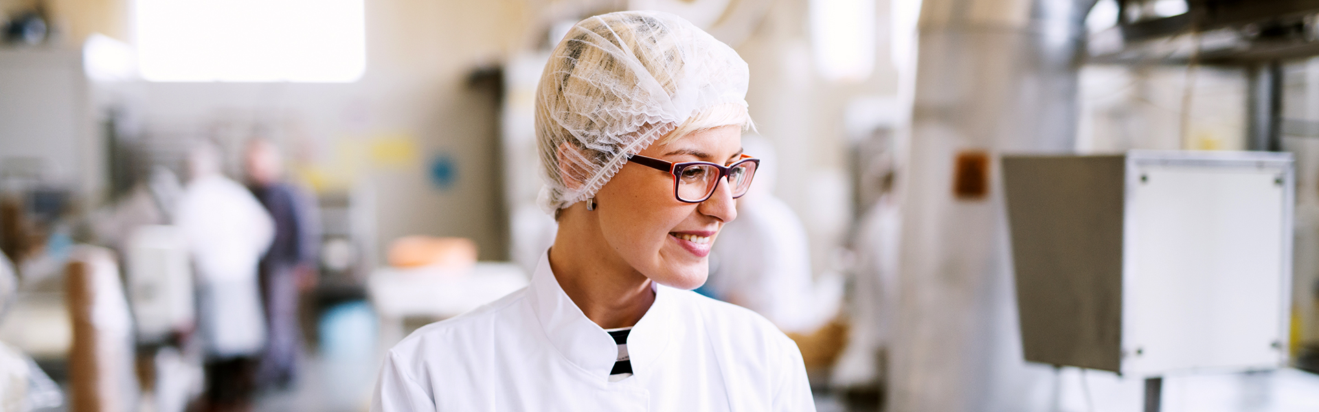 image of a young woman in a food processing plant